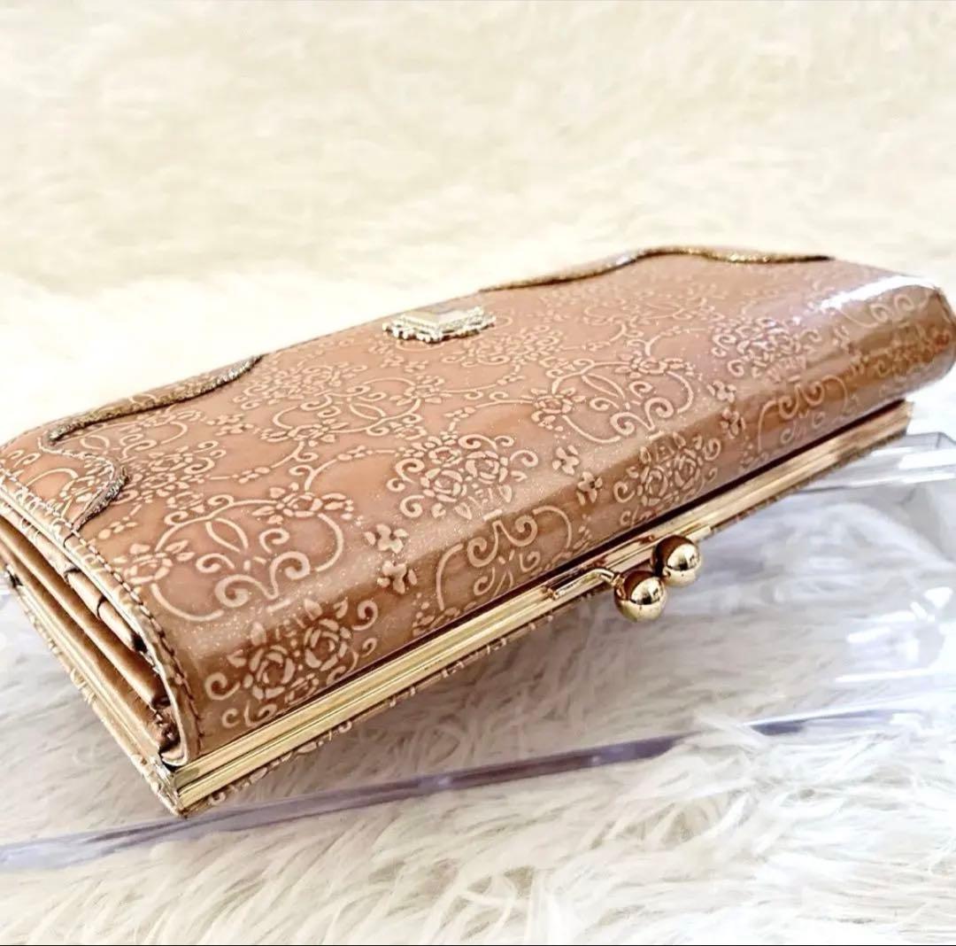 【新品✨】ANNA SUI ルーミー がま口　二つ折り長財布 ピンクベージュ