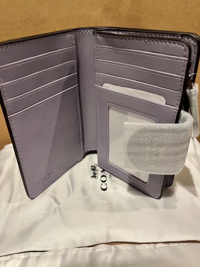 COACH ラベンダー 二つ折り財布 ACCORD VAR LTH 22753