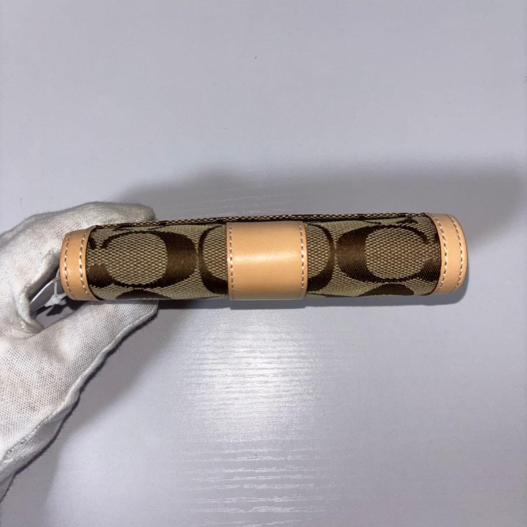 0074 新品、未使用 COACH シグネチャー レディース 折り財布