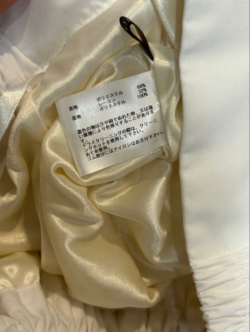 「新品未使用」Olu. 【ラッピングスカートホワイト】定価 ¥12,000税込