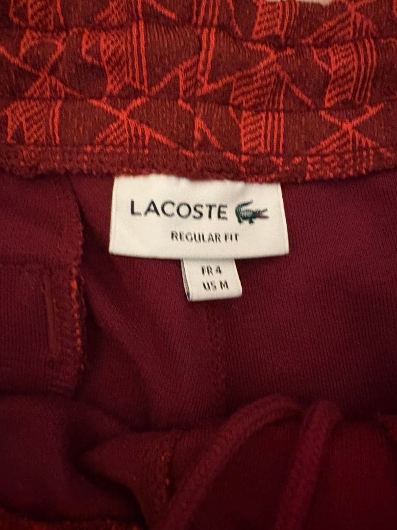 Playsson着用 LACOSTE ラコステ モノグラムトラックパンツ 赤