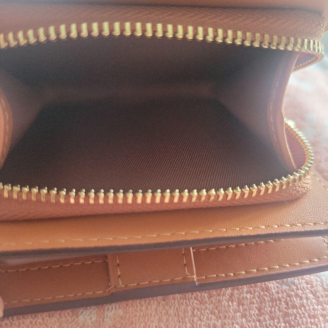 COACHコーチシグネチャースヌーピーコラボ二つ折り財布