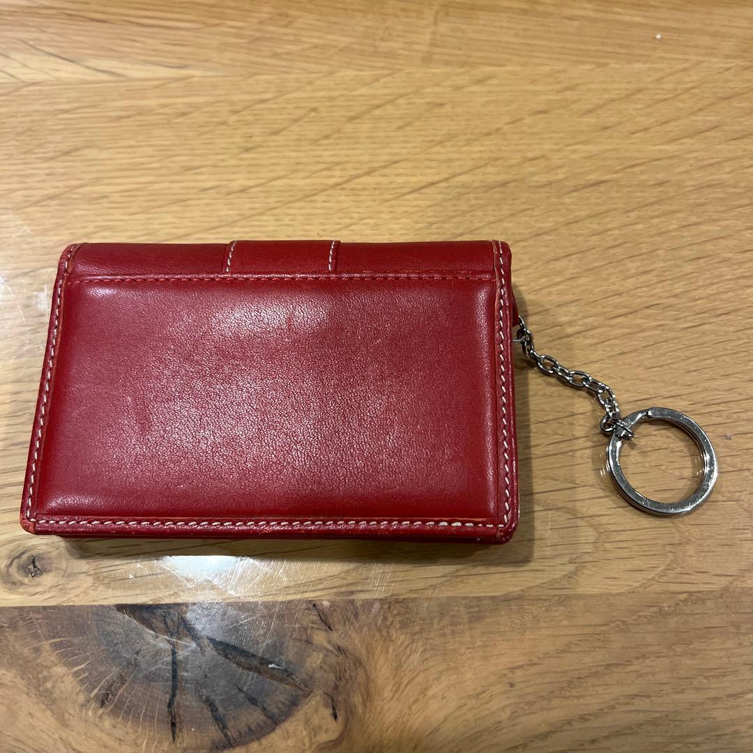 Coach レザー製赤い二つ折り財布 キーチェーン付き