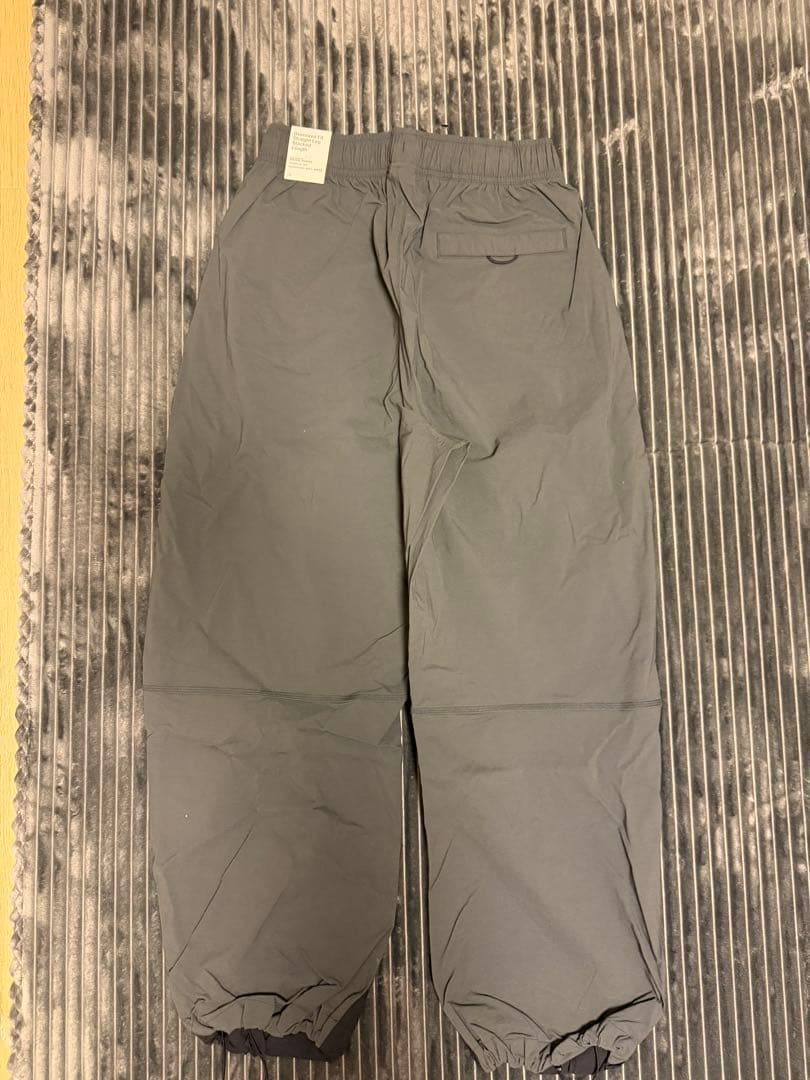 新品未使用　ナイキテックメンズ ウーブンオープンヘムパンツ　Mサイズ