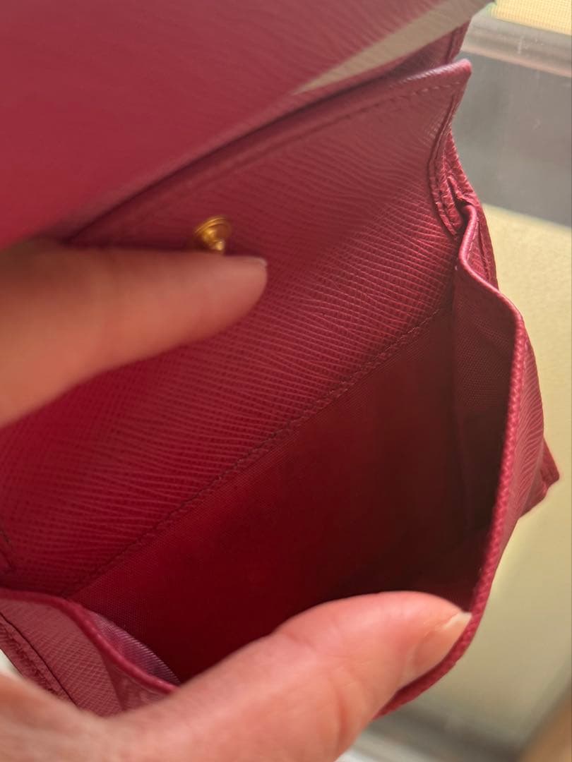 PRADA ピンク 二つ折り財布 サフィアーノレザー