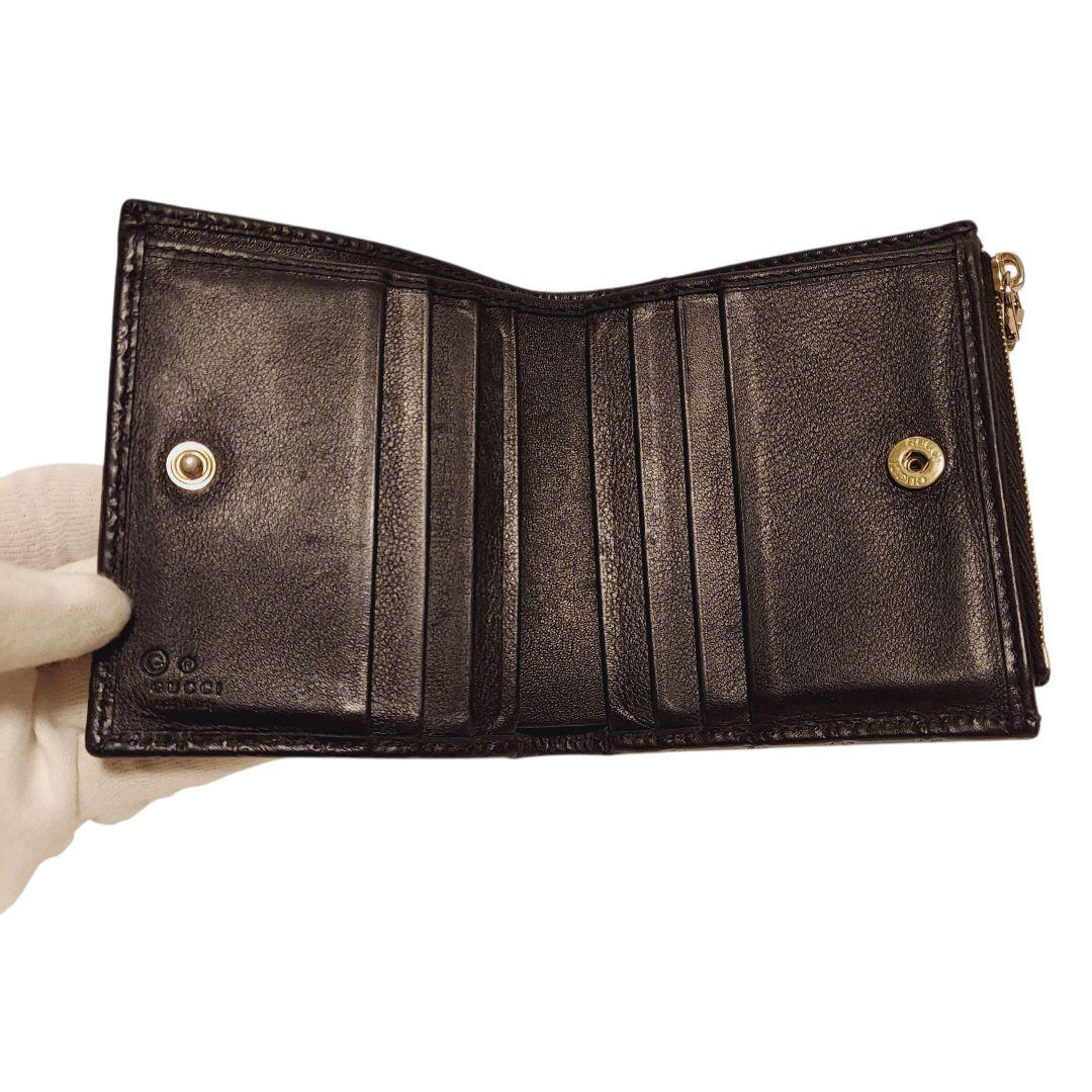 【GUCCI】2つ折り財布 黒 マイクロ レザー 型押し