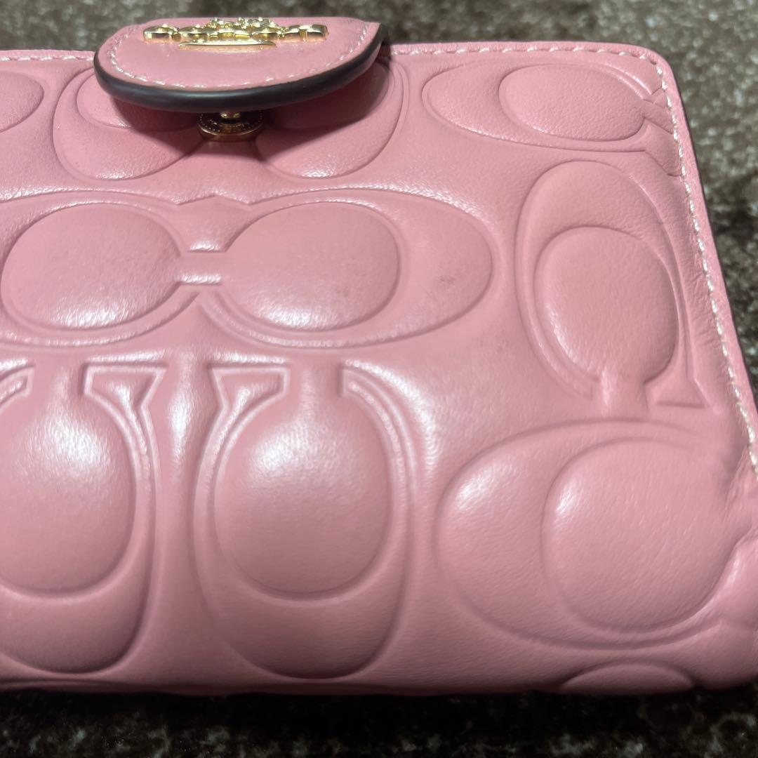 COACH ピンク エンボス 二つ折り財布