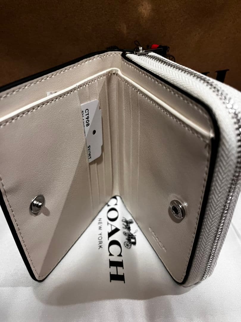 COACH ストロベリー柄 二つ折り財布