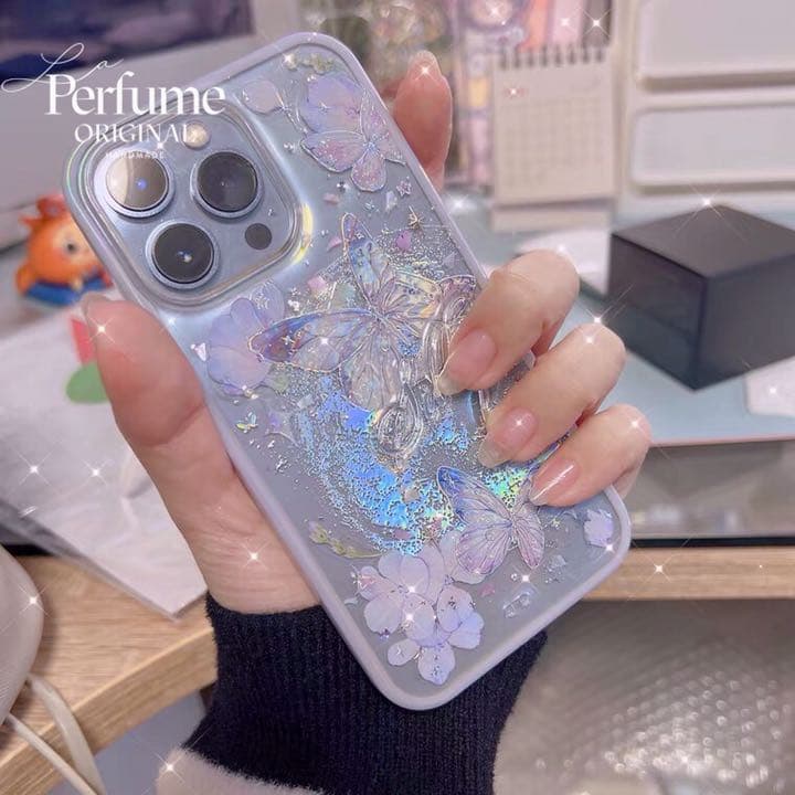 バタフライ✨名入れ♡キラキラ✨レインボー 花 イニシャル フチiPhoneケース