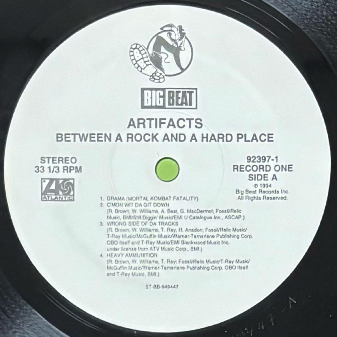 洋楽 ARTIFACTS / Between A Rock And A Hard Pl