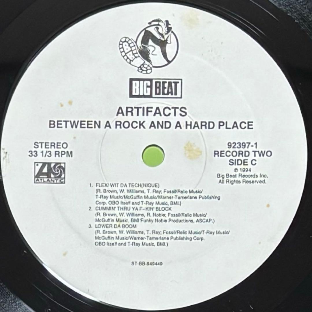 洋楽 ARTIFACTS / Between A Rock And A Hard Pl