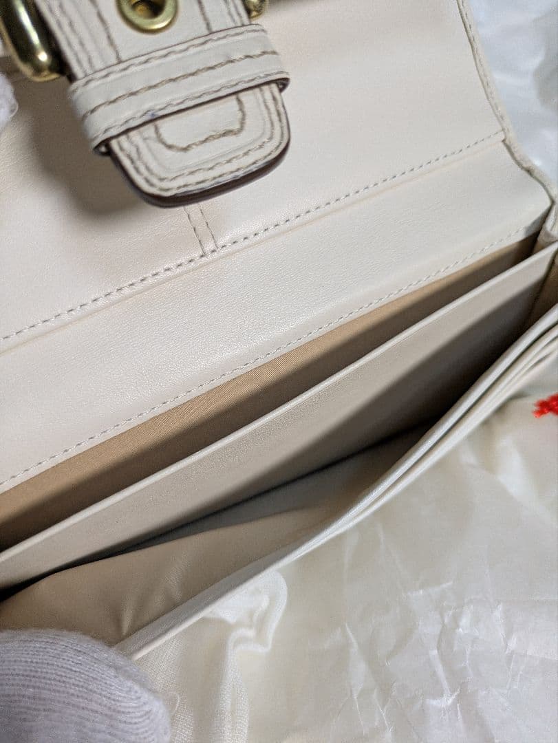COACH コーチ　三つ折り財布 ピンクと紫のパターンシグネチャー未使用品