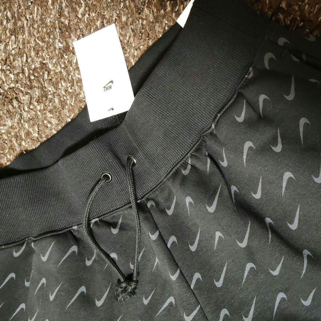 新品 NIKE セットアップ ナイロンパーカー 総柄 フリースパンツ 上下セット