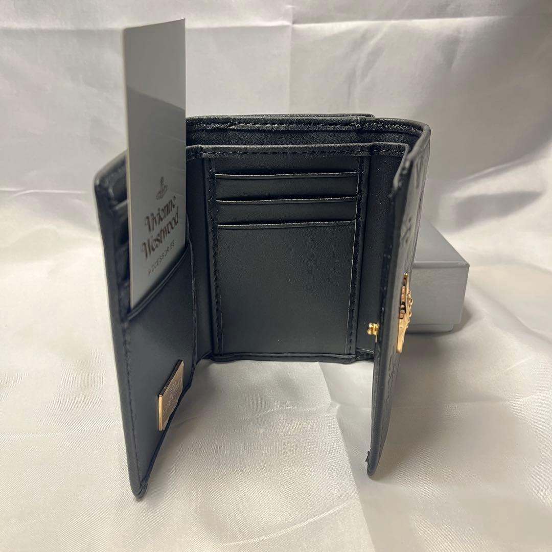 新品 Vivienne Westwood 黒ヴィヴィアン柄 三つ折り財布 人気