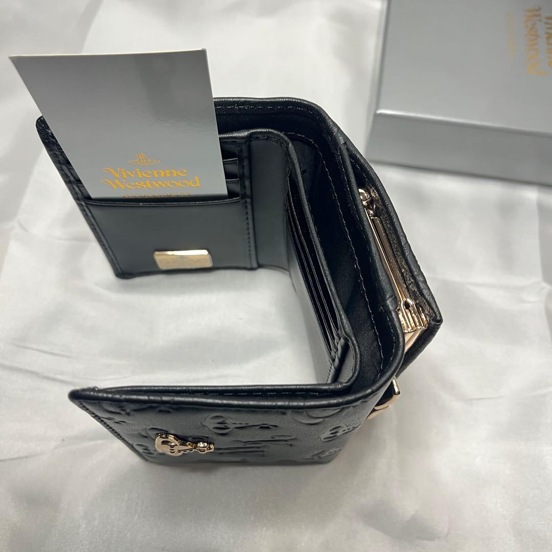 新品 Vivienne Westwood 黒ヴィヴィアン柄 三つ折り財布 人気