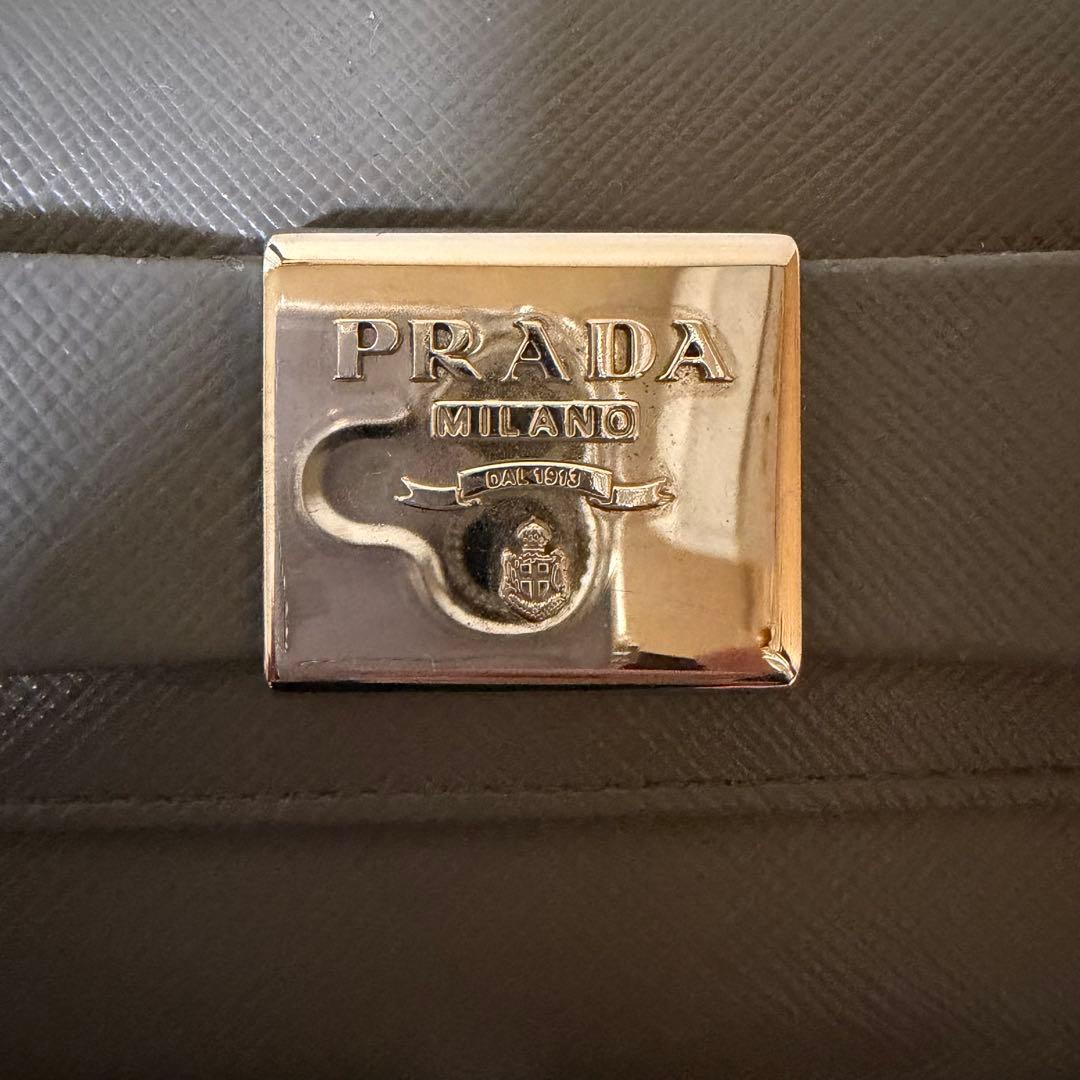 外箱/保証書付き PRADA ミニ財布 サフィアーノレザー リボン