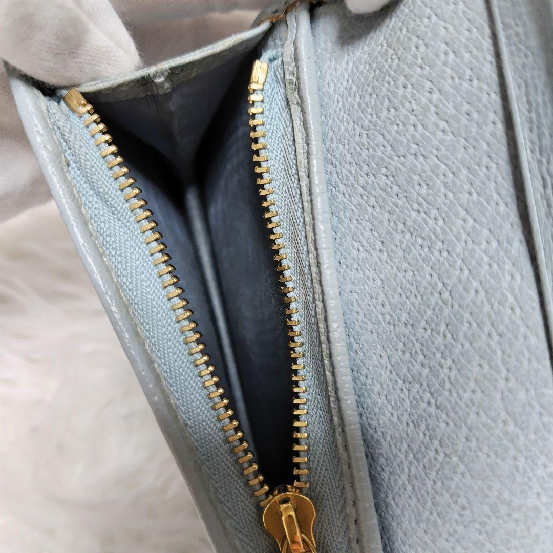 レア美品✨グッチ◇日本限定モデルフローラ二つ折り財布　ゴールド金具水色レザー