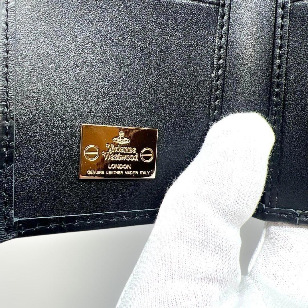 ヴィヴィアンウエストウッド 　レザーブラック　三つ折財布　模様入
