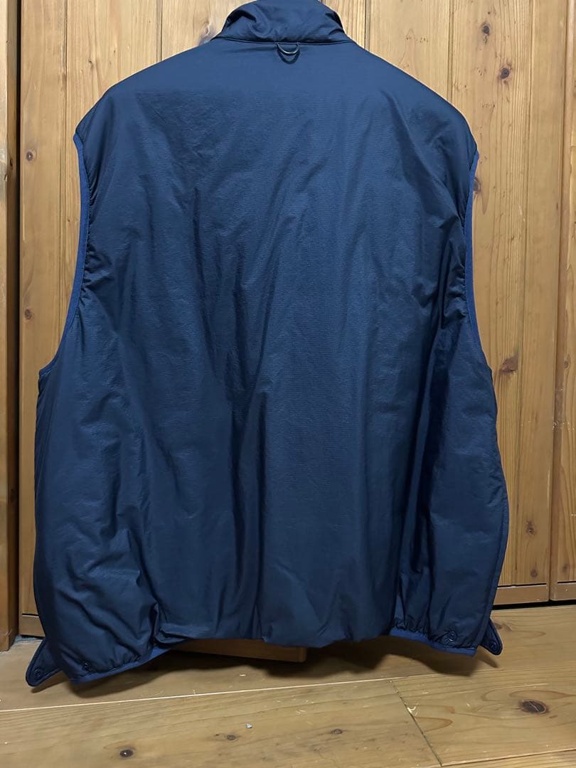 専用TECH REVERSIBLE PULLOVER PUFF VEST