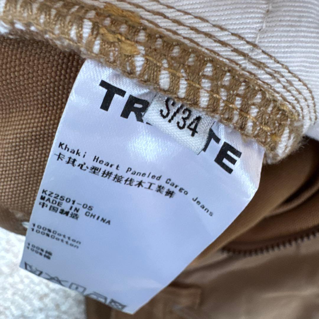 trinite studioカーキ色ダメージ加工ワイドレッグデニムパンツ
