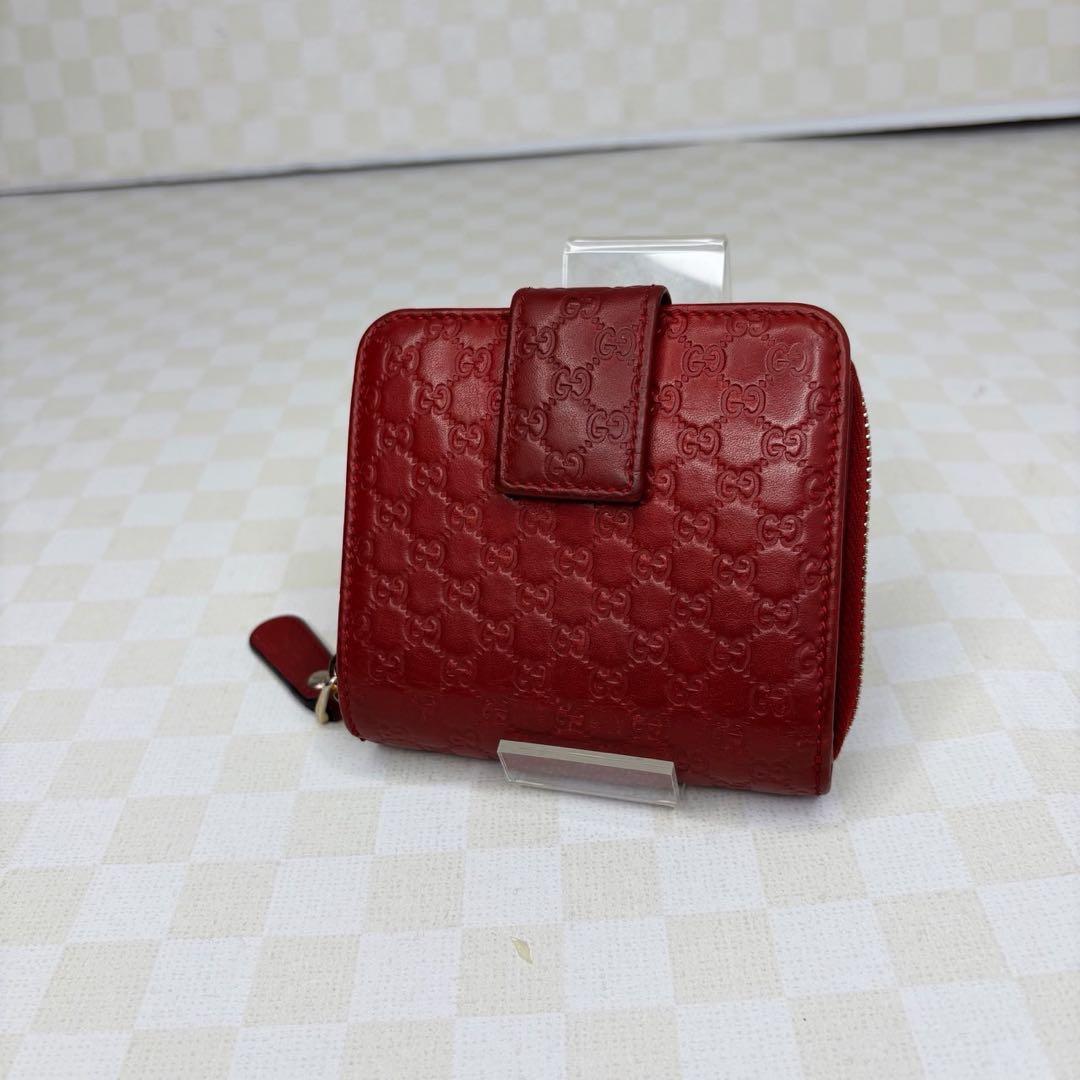 極美品　GUCCI グッチ　二つ折り財布　レザーシマ　M08