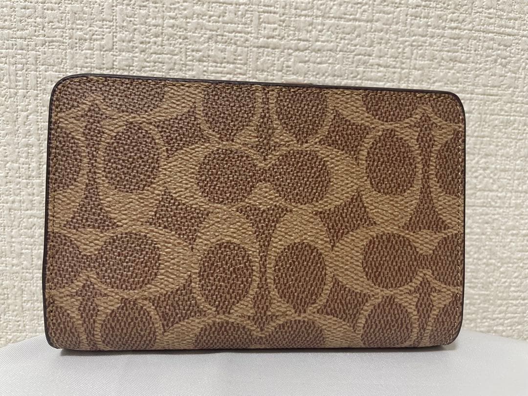 コーチ　レディース　折財布　ブラウン　小銭入れあり　新品　未使用