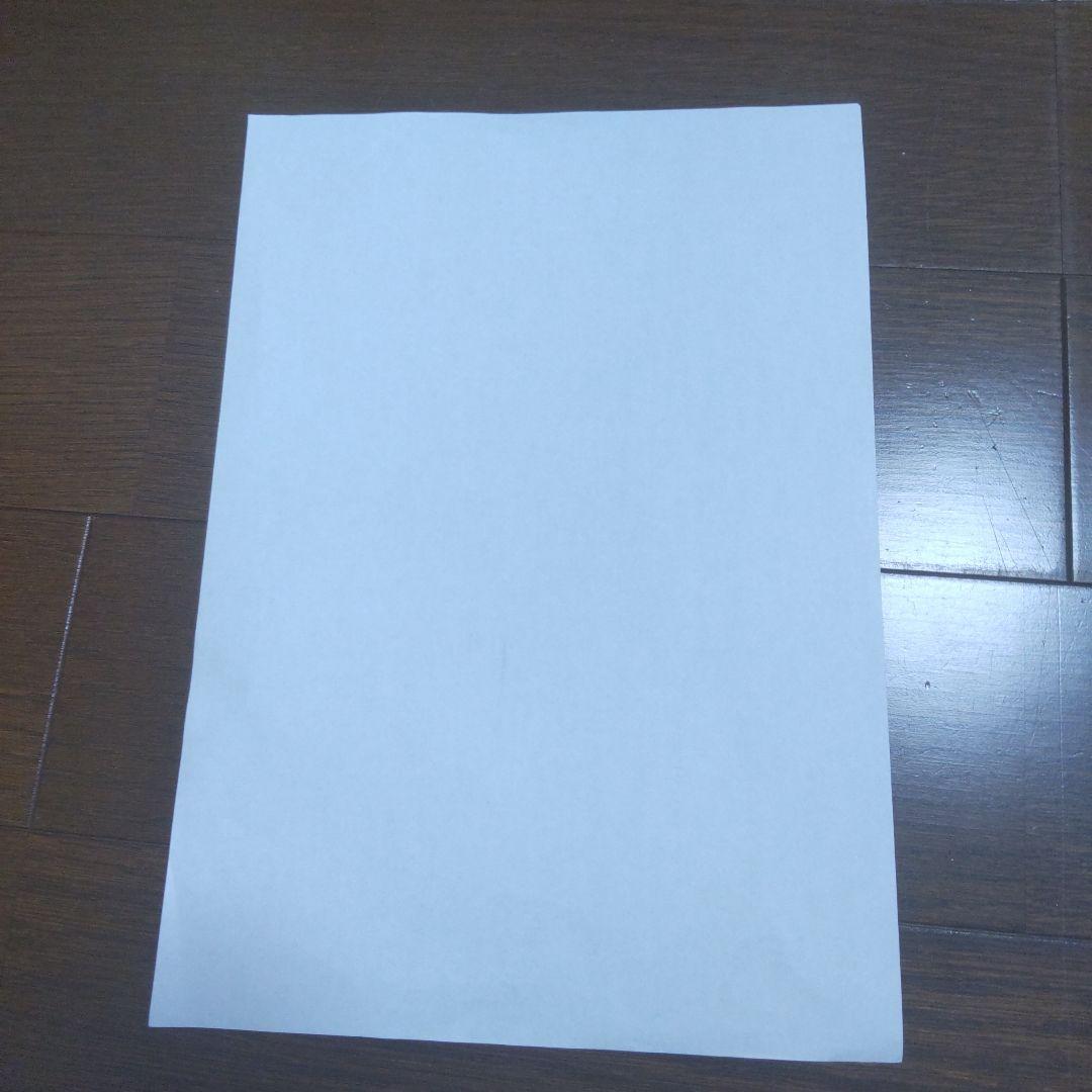塾の先生が問題を解く際に使った紙（顔が整っている男性の塾講師）