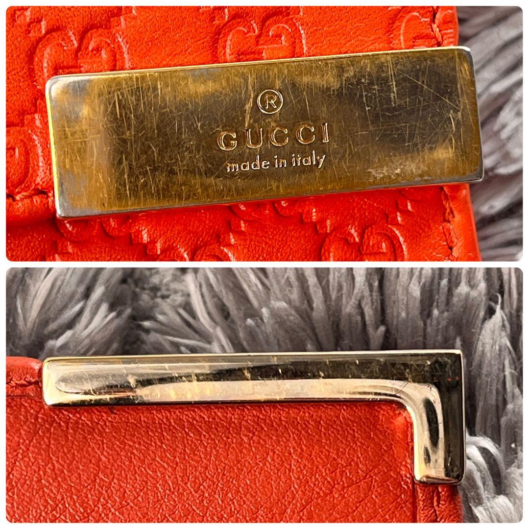 美品✨GUCCI マイクロシマ　折り財布　オレンジ　ロゴプレート　Wホック
