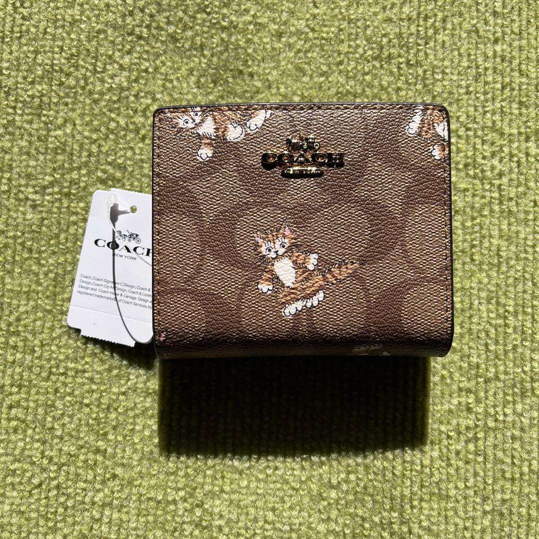 COACH 猫プリント 二つ折り財布